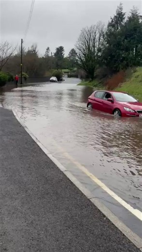 "I don't know how authorities can say its safe to pass with due care and attention, when it clearly isn't. How many more vehicles need to be damaged or destroyed?" Watch as cars continue to get stuck on notorious flooded road despite resident's warnings | Belfast Live
