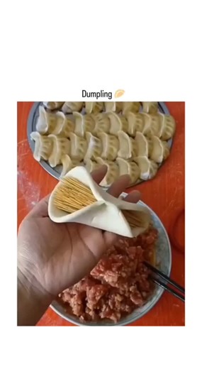 followtrend881 on Instagram: "https://t2m.io/Blue26 The post features a 21-second video tutorial demonstrating a toothpick-assisted technique for folding pleated dumplings, where wrappers are filled with minced meat and sealed using toothpicks for neat edges, though one remains visibly protruding in the final dumpling. It has garnered over 11 million views and 5,000 likes within days, with replies largely focusing on humorous concerns about the leftover toothpick, such as choking hazards or play