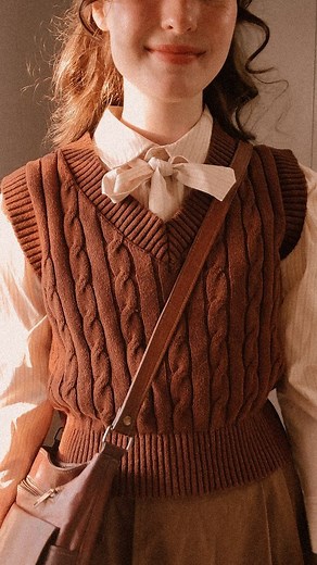 Abigail on Instagram: "Styling this retro button-down blouse from @simpleretro Isn't it adorable?? I love the oversized fit with the casual over the shoulder sleeve seams, the cute lil' bow detail, the lovely stripes, and just the overall vibe!! I paired it with my 100% cotton vest, which I got for like - $15 on @mercari ! 😲 Y'all, you seriously need to check out this secondhand app. It's so awesome. My skirt is also from @simpleretro , but I'm not sure that they're still selling it."