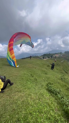 Paragliding Adventure Over Scenic Mountain Landscapes