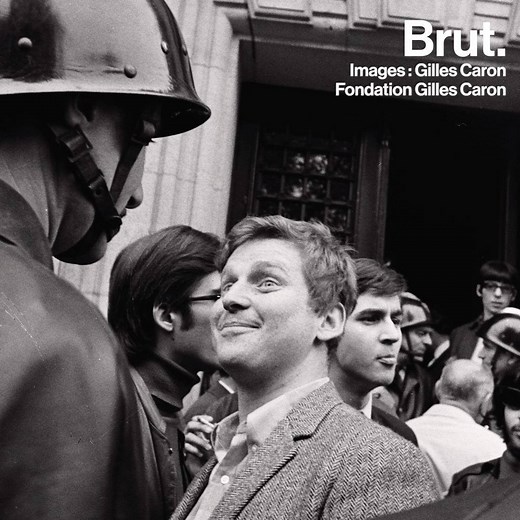 C'est la photo symbole de mai 68 : Daniel Cohn-Bendit narguant un policier devant la Sorbonne. 50 ans plus tard, l'émission C Politique les a de nouveau réunis... | Brut
