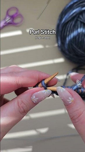 How do you make a purl stitch?