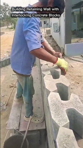 Building Retaining Wall with Interlocking Concrete Blocks