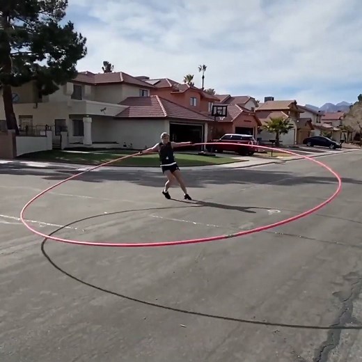 This woman uses a 17-foot-wide hula hoop to show how to properly practice social distancing😮⭕ | AOL