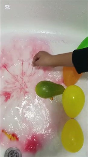 How many colored balloons do you see?