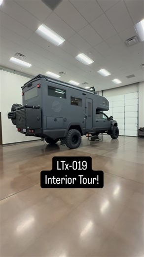 EarthRoamer on Instagram: "LTx-019 is officially delivered and headed off-grid! This build is packed with details that make it feel like home. Rustic cherry alder wood brings warmth throughout the interior, and hammered European glass cabinet inserts add a handcrafted touch. It features an Invisacook hidden induction system, a 10 cubic foot fridge and freezer for extended travel, and an L-shaped dinette with a 32 inch TV on a custom swivel arm. Perfect for unwinding after a long day on the trail