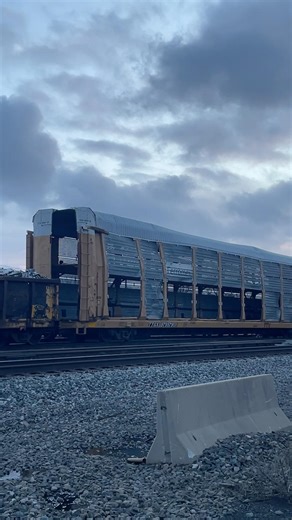 Damaged auto rack that probably got in a derailment