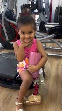 Cute Little Girl Above Knee Amputee Walking with Prosthetic Legs Inspiring Artificial Limb Training