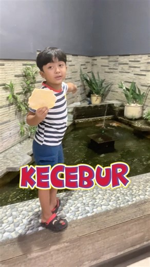 Falling into the fish pond🫣 #shorts