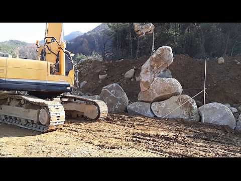돌쌓기.전석쌓기.석축.조경석.자연석.포크레인.poclain.stone masonry.stone mason