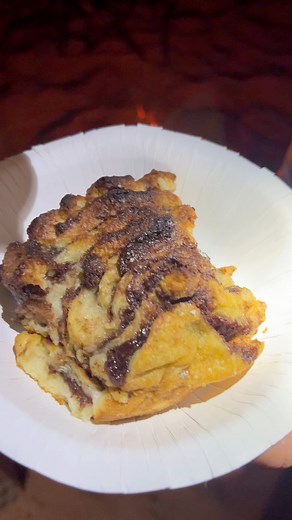 Nutella Pudding cooked in the camp oven 👅 🤤 🔥 🤎.#camping #camp #campcook #campcooking #campfire #campingcooking #campingcook #campoven #campovencooking #dutchoven #dutchovencooking #campfirecooking #camprecipes #campingrecipes #campdessert #nutella #nutelladessert #nutellasandwich #whitebread #bread #dessert #baking #dessertrecipe #nutellalover #nutellarecipes #nutellapudding #pudding #puddingdessert #yum #scrumptious | MoysOutdoors