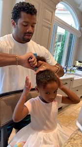 Russell Wilson styling his daughter Sienna Princess' hair 😩 Her little smile at the end! [cred: Ciara/IG] | Capital XTRA