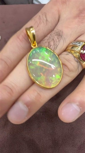 A Blaze of Colour in 22K Gold-34.84 Carats of Rare Australian Opal Brilliance.