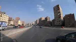 Traffic jam in downtown city of Cairo with cars and busses, summer tourism