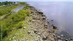 Lake Okeechobee shore line aerial view pushing-in