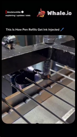 BlackAndWhite on Instagram: "This process works by feeding multiple thin pen refills along precision guides while a top-mounted mechanical press applies controlled downward force through a threaded adjustment bolt and contact shoe to hold or index each refill in the correct position. As the refills advance, they pass through a filling or sealing station where ink is injected under pressure into the internal reservoir, while excess air is simultaneously vented out through micro-openings to preven