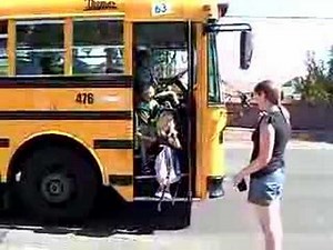 Emma & Sam getting off the bus