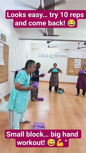 Using a yoga block to support and strengthen the hands, improving stability, and joint mobility.