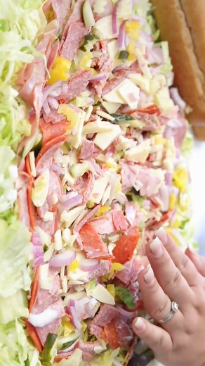 6.1K views · 33 reactions | This Chopped Italian Grinder Sandwich is a trendy TikTok craze that is worth every bite! Loaded with all the goodness of Italian meats, cheese, grinder salad, and a delicious seasoned dressing served up on crusty bread! It's an easy, filling meal that you can whip up for lunch at home or to feed a crowd! Full recipe on RoseBakes.com. . . . #choppeditaliangrinder #italiangrinder #viralrecipe #sandwiches #rosebakes | RoseBakes.com | Facebook