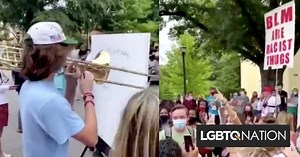 Freshman goes viral after using his trombone to drown out a racist anti-LGBTQ demonstrator - LGBTQ Nation