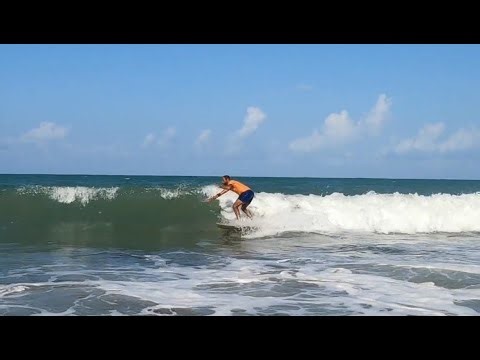 Surfing in Pipa, Brazil
