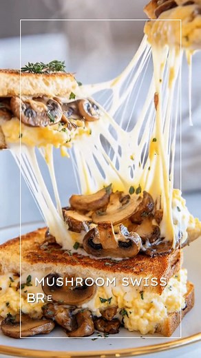 There’s nothing quite like a warm, cheesy breakfast sandwich to start your morning right. This Mushroom Swiss Breakfast Grilled Cheese combines buttery toasted bread, soft scrambled eggs, earthy mushrooms, and melted Swiss cheese — a cozy, satisfying meal that feels a little gourmet but takes just minutes to make. What You'll Need 4 slices of bread (sourdough or your choice) 1 tablespoon butter, softened 1 teaspoon garlic powder 1 cup mushrooms, sliced 1 teaspoon olive oil 3 large eggs Salt and 
