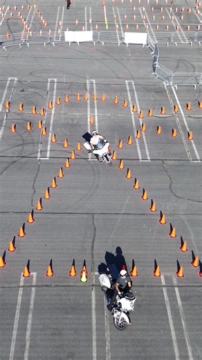 Two Loudoun County Sheriff's Office Motor Officers in a precision pattern at the 46th Annual Mid-Atlantic Police Motorcycle Riding Committee, Inc. Rodeo #slowspeedmotorcycleskills #motorcycletraining #motorcycleskills #harleydavidson #harleydavidsonroadking #harleydavidsonelectraglide #superseer #bmwmotorrad #motorcyclerodeo #policemotorcyclerodeo #novaslowspeed #novaconecamp #djimini3 #djimavicair2 #goprohero11black #insta360x3 | Brad Mcknight