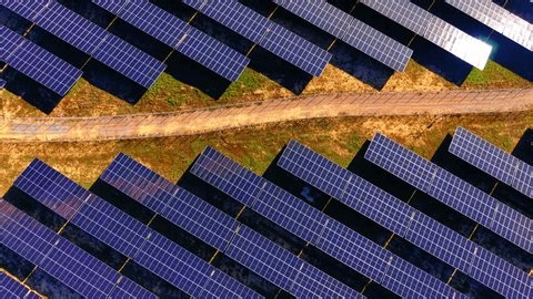 clip-4041118143-solar-module-arrays-separated-by-dirt-maintenance