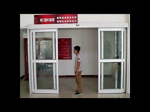 Automatic sliding door operator with Emergency push function