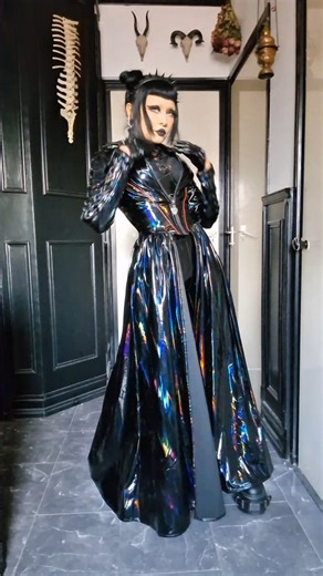 Ana Rosa Pano Ortiz on Instagram: "🖤⚙️ Ruling the Darkness in High-Shine PVC ⚙️🖤 Today I wear shadows and metallic reflections: black PVC, sharp lines, and a silhouette born from pure industrial goth energy. A coat that moves like a storm, a corset that shapes every detail, and boots that walk with authority through any nocturnal realm. This outfit is my armor— fierce, elegant, and unmistakably mystical. The perfect balance of dark aesthetics and feminine power. The darkness doesn’t consume me