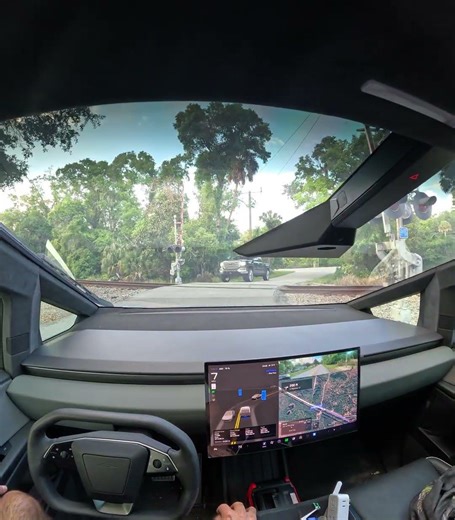 Cybertruck FSD V14.2.2.5-Very narrow RR crossing and two oncoming cars. Handles it like a champ.