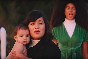 The Video for Cher’s “SOS” Cover Uses ABBA’s Original Visuals to Send a Very Different Message