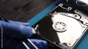repairman fixing computer hard disk drive in service center Stock Video
