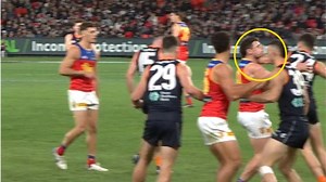 Lachie Neale clipped by Nic Newman in high shot on the chin