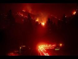 Fire roaring through Northern California triples in size