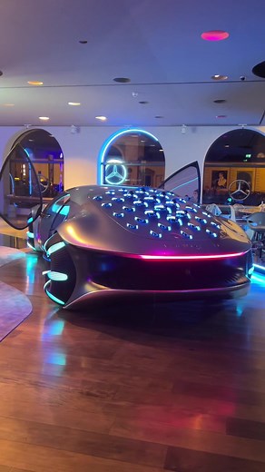 Futuristic Car Design Showcase in Modern Showroom