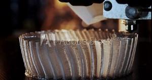 3D printer working. Fused deposition modeling, FDM. 3D printer printing an object from plastic. Automatic three dimensional 3d printer performs plastic. Progressive additive technology for 3d printing