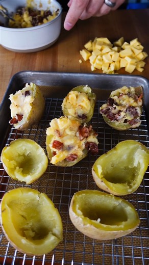 The final Tackle Takeout recipe is here. Loaded potato skins with Wisconsin Cheese, bacon, and Yancey’s Fancy cheese. Gameday snacking at its finest.🏈 Missed a Tackle Takeout video? Find them all here: https://ow.ly/xx9I50YavBx | Tops Friendly Markets