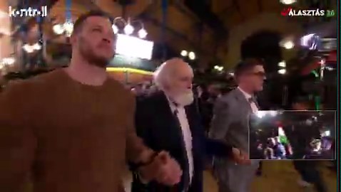 This is Gábor Iványi, a Hungarian Methodist pastor, social activist, and public figure. He is the leader of the Hungarian Evangelical Fellowship and the founder of the Oltalom Charity Association.For decades, he has worked with homeless people, the poor, refugees, and others in need, and he operates a network of social institutions. He baptized the children of Viktor Orbán, but they later fell out politically, and Orbán came close to ruining him completely. Gábor Iványi and his organization, par