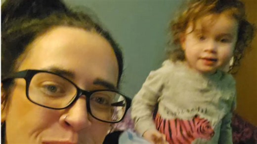 Girl encourages her daughter to dance before getting smacked in the face