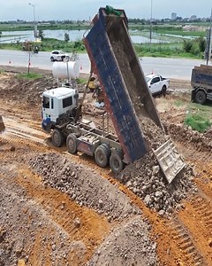 1.3M views · 9.2K reactions | Engineering Elegance: Shantui Bulldozer's Landslide Project and Road Construction Around Water | Bulldozer City | Facebook