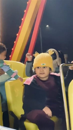 Tiny girl, big adventures 🎡💛#cutegirl #amusementpark #funfair #kidsfun #tinyexplorer