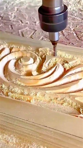 creating an intricate floral pattern on a wood surface using a high precision cnc routing machine