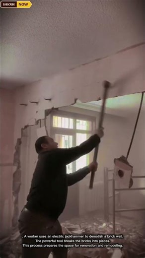 Wall Demolition Process Using Electric Jackhammer in Home Renovation