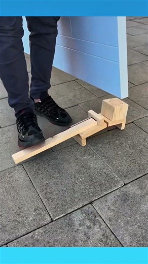 Door hinges using a simple wooden jig to keep the door panel upright and aligned while drilling.