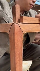 Using extra wood to secure the chair leg frame, making the structure stronger and long lasting #wood