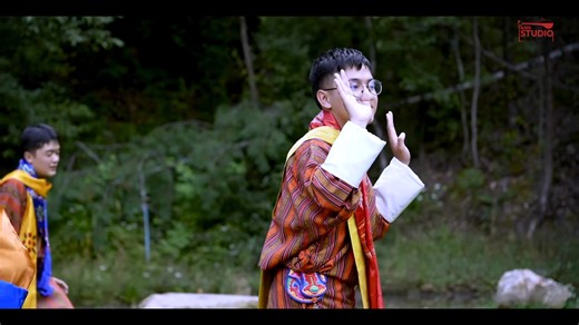 The yangchen is a traditional Bhutanese musical instrument, a hammered dulcimer played by striking its strings with small hammers. It was introduced to Bhutan from Tibet in the 1960s and is a popular instrument used to accompany folk songs and dances, often painted in traditional colors like blue, green, and red. Type: Stringed instrument, specifically a hammered dulcimer. How it's played: Musicians strike the strings with small hammers to produce sound. Origin: It is not indigenous to Bhutan; i