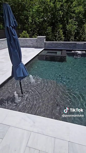 14'x24' rectangle pool with flush spa and ice white marble coping and decking in Atlanta. #swimmingpool #poolman #pebbletec #pool #gapoolbuilder #artisticpools #pools #foryoupage #fyp #jandypoolproducts #pools #poolparty #luxurypools #poolmanluke #masterpoolguild #smallpools #tinypools #atlanta #druidhillsga