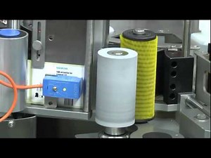 HERMA 040M HC - Wrap-around labelling machine, designed for the healthcare industry