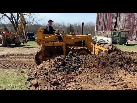 Old International TD-9 Bulldozer Pushing Some Dirt